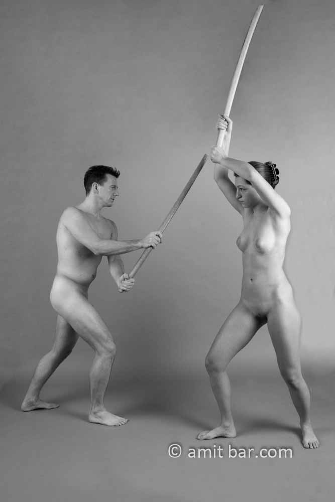 Fighters I: Nude man and woman exercising martial arts