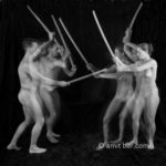 Fighters II: Nude man and woman exercising martial arts