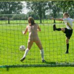 Goalkeeper III: Nude goalkeeper at football match