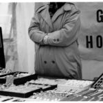 Golden hands: A open market seller of golden watches in Doetinchem is hiding his hands in his sleeves on a cold day