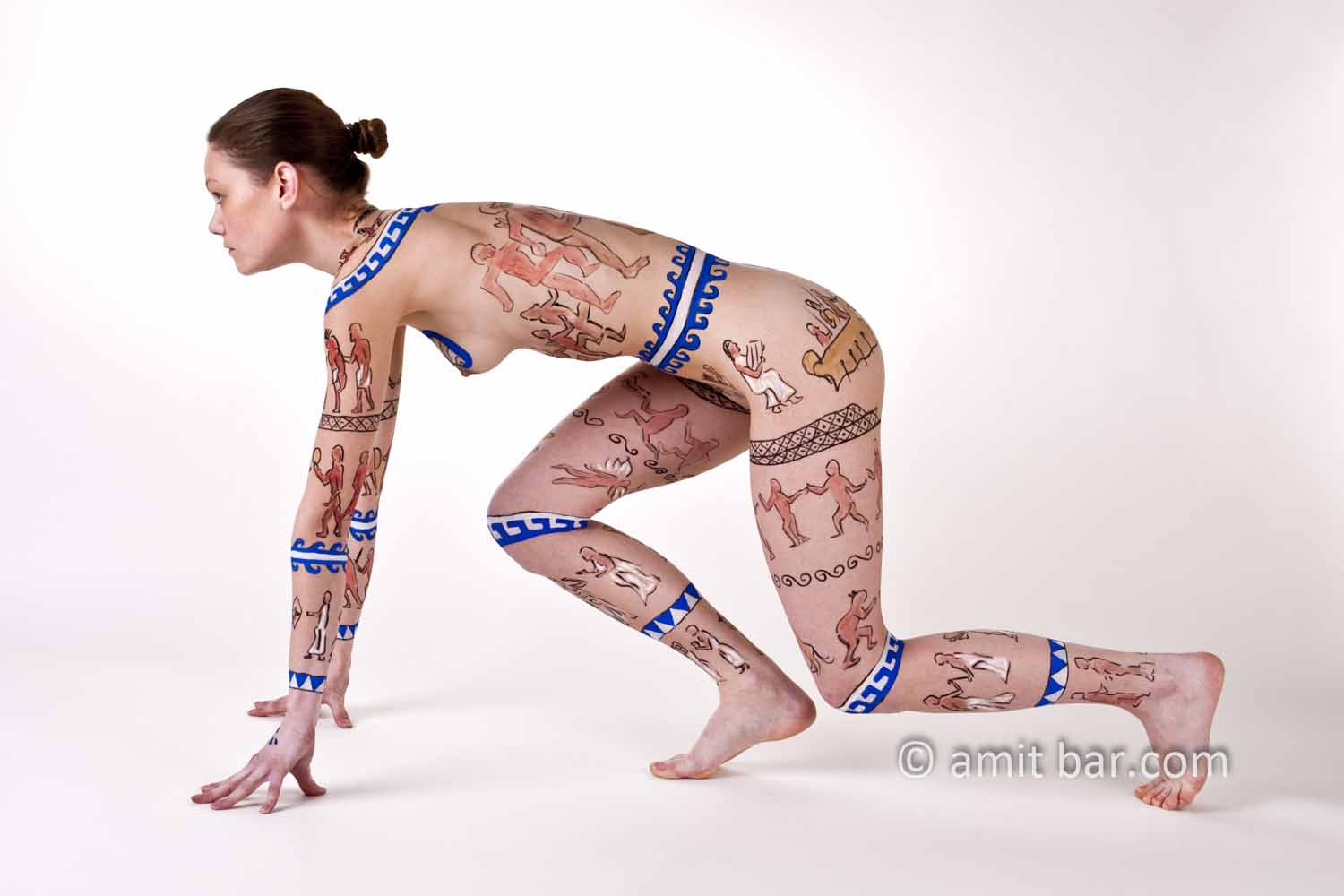 Greek athlete II: Body-painted model in Greek symbols