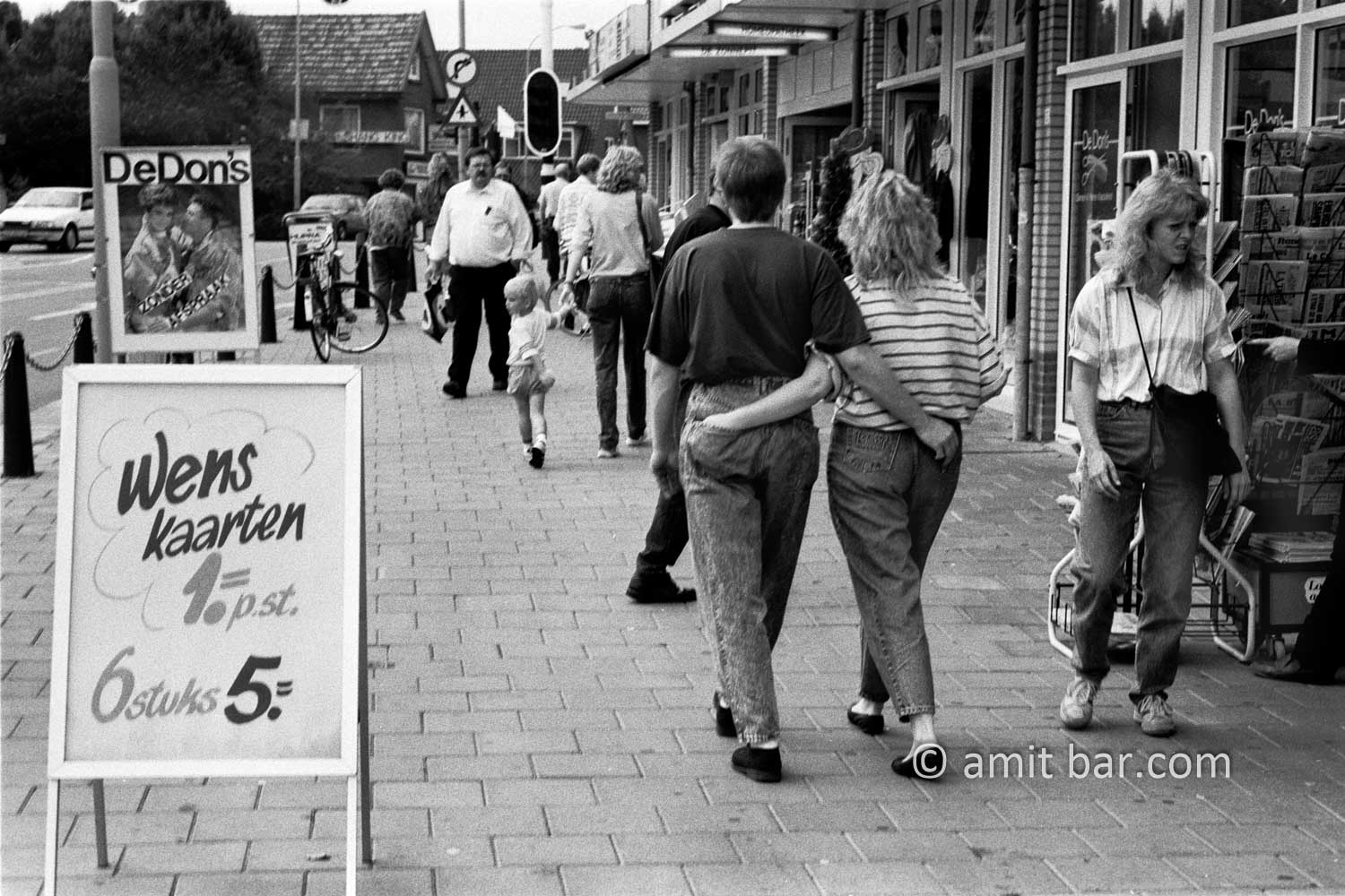 Greetings cards: A couple in love passes by greetings cards shop in Doetinchem, The Netherlands