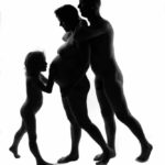 Happy family II: Pregnant woman, her husband and daugter