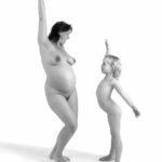 Happy family IV: Pregnant mother and her daughter