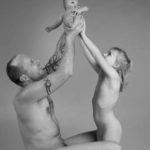 Happy family VIII: High up: Father, daughter and baby