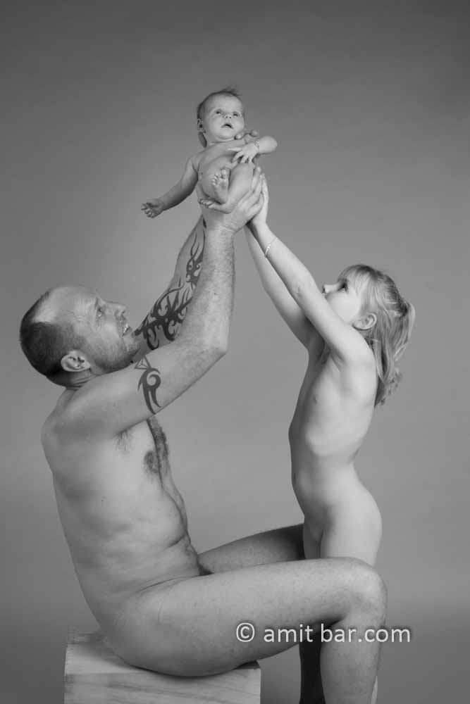 Happy family VIII: High up: Father, daughter and baby