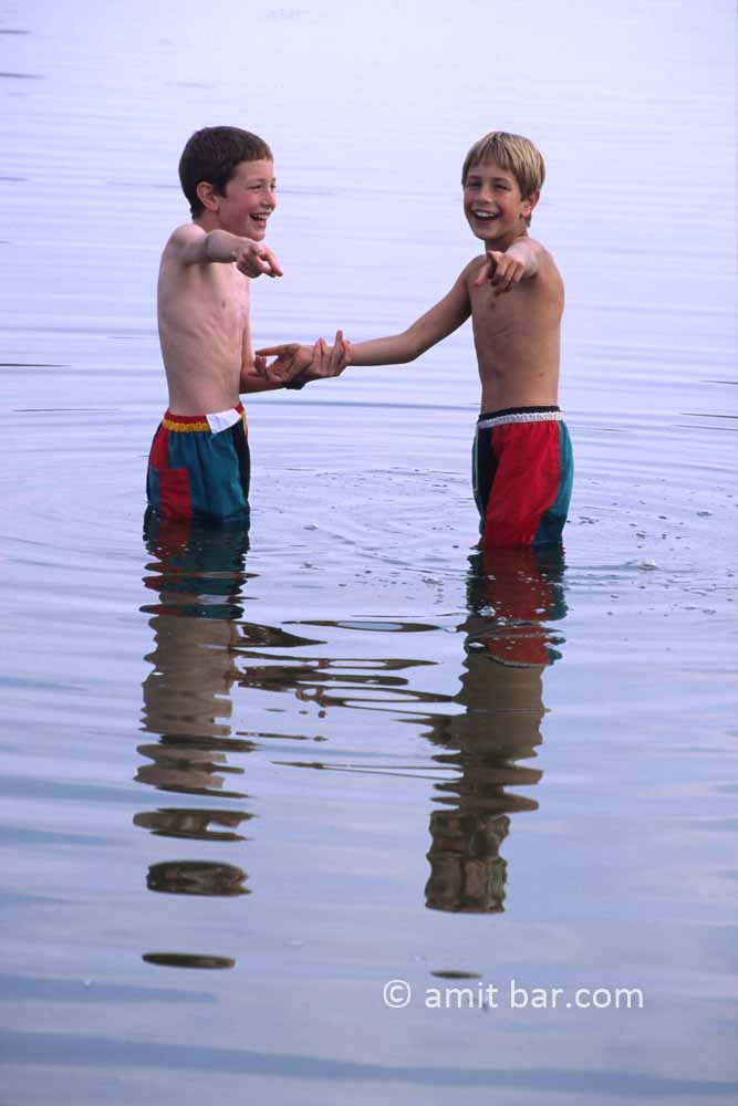 Having fun 2: Two boys amusing the photographer