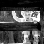 Looking from the ladder: A child is looking down from a ladder