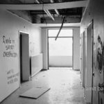 Love is...: Last notifications of staff and patients on the walls of a corridor in abandoned hospital before the demolition. Doetinchem, The Netherlands