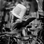 Lunch break: Somebody set a basket on the head of a sculpture in Doetinchem, The Netherlands