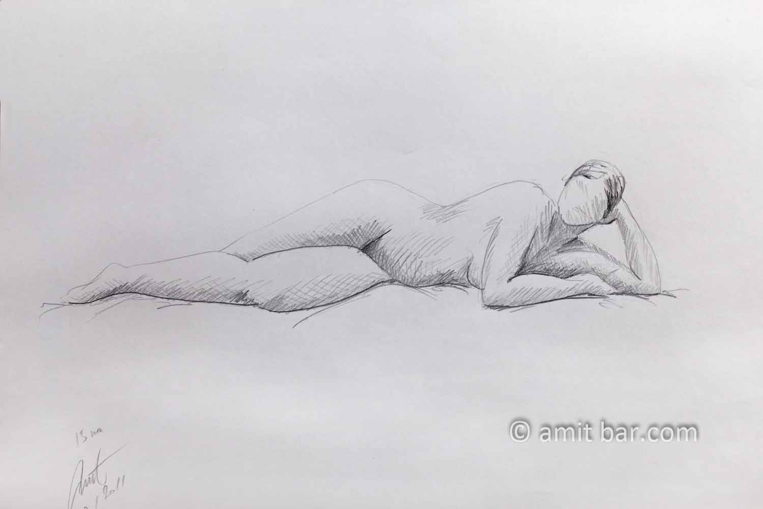 Lying model is leaning on her hand. Pencil drawing