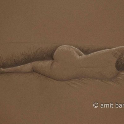 Laying nude model from her back on brown paper