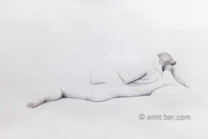 Lying nude model from the back. Pencil drawing
