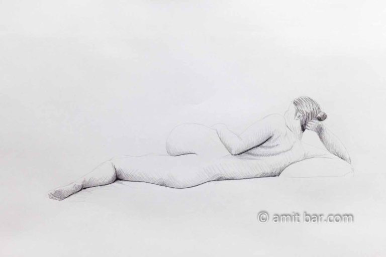 Laying nude model from the back