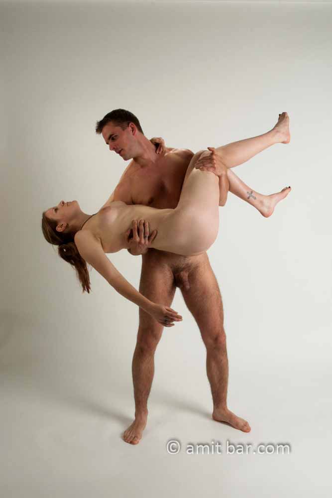 Macho: Nude man lift his nude wife