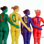 Millenium girls I: Four body painted girls are celebrating the mlilenium