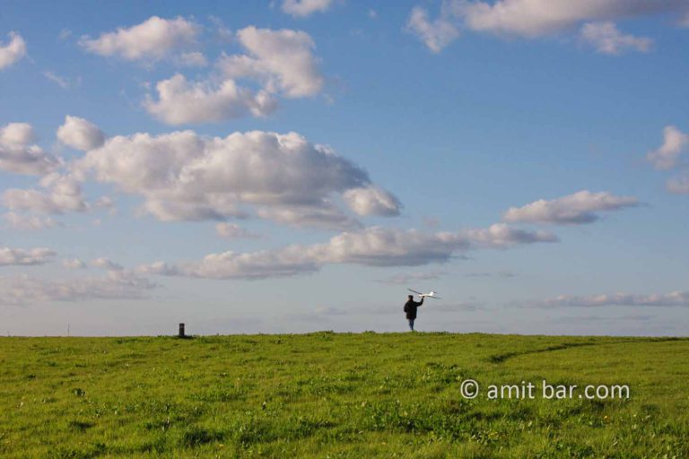 Model airplane with clouds