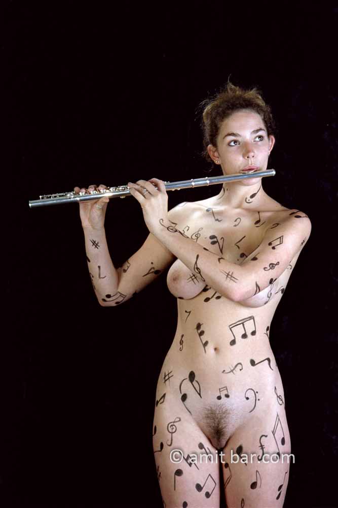Music notes II: Body-painted model playing flute