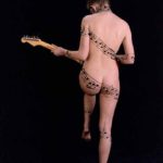 Music staff IV: Body-painted model in music-notes