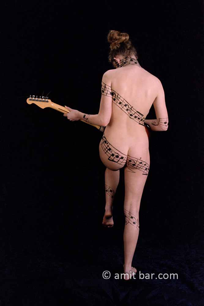 Music staff IV: Body-painted model in music-notes