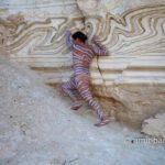 Nachal Prazim I: Body painted model at the desert of the Dead Sea, Israel.