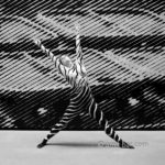 New paint I: Body-painted dancer at a painted wall in DRU