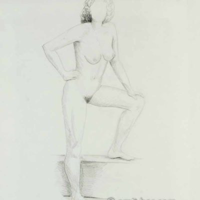 Nude figure with leg on box