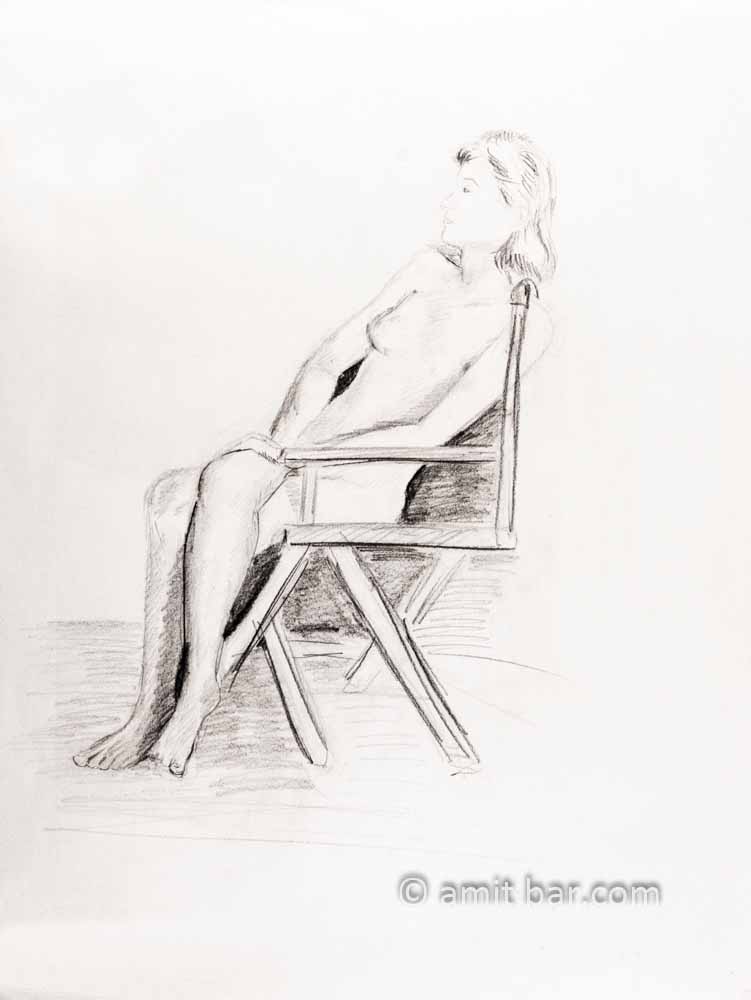 Nude woman on wooden chair. Pencil drawing