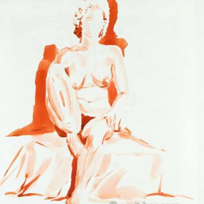 Nude woman sitting on low box