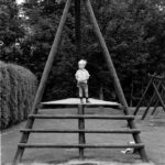 On stage: Boy looking from a playing-stage