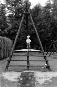 On stage: Boy looking from a playing-stage