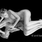 On the mirror: Nude model lying on a mirror