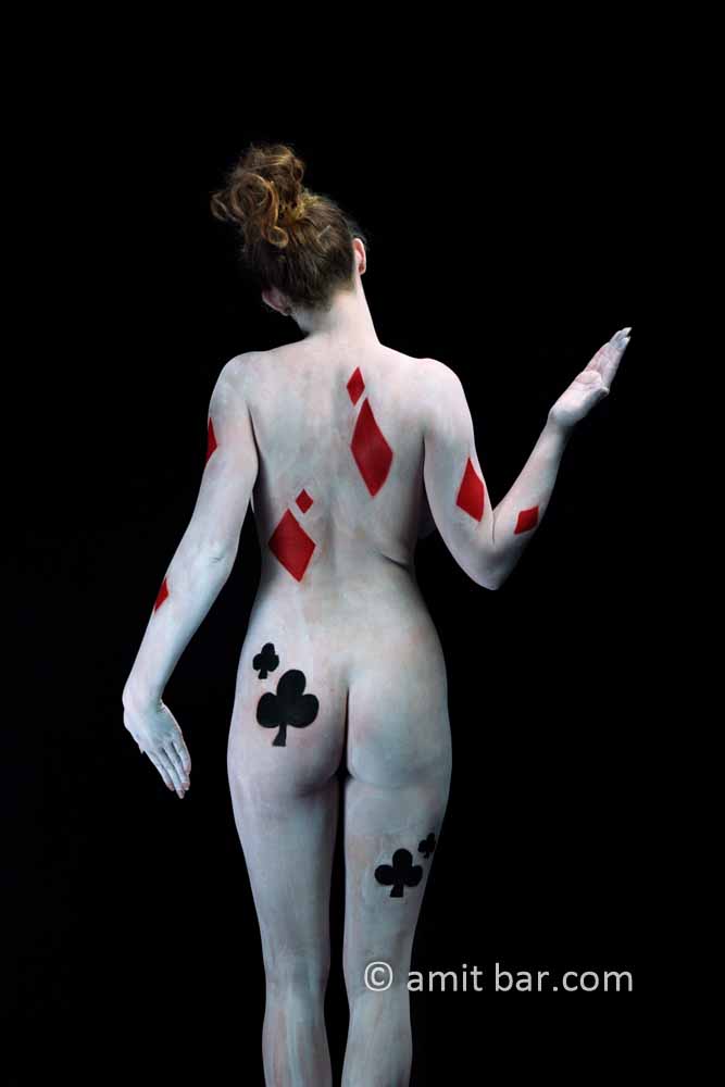 Playing cards II: Body-painted model in card forms of diamonds and spades