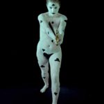 Playing cards VI: Body-painted model in card form of clovers