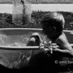 Playing in bath III: A child is plaing in bath