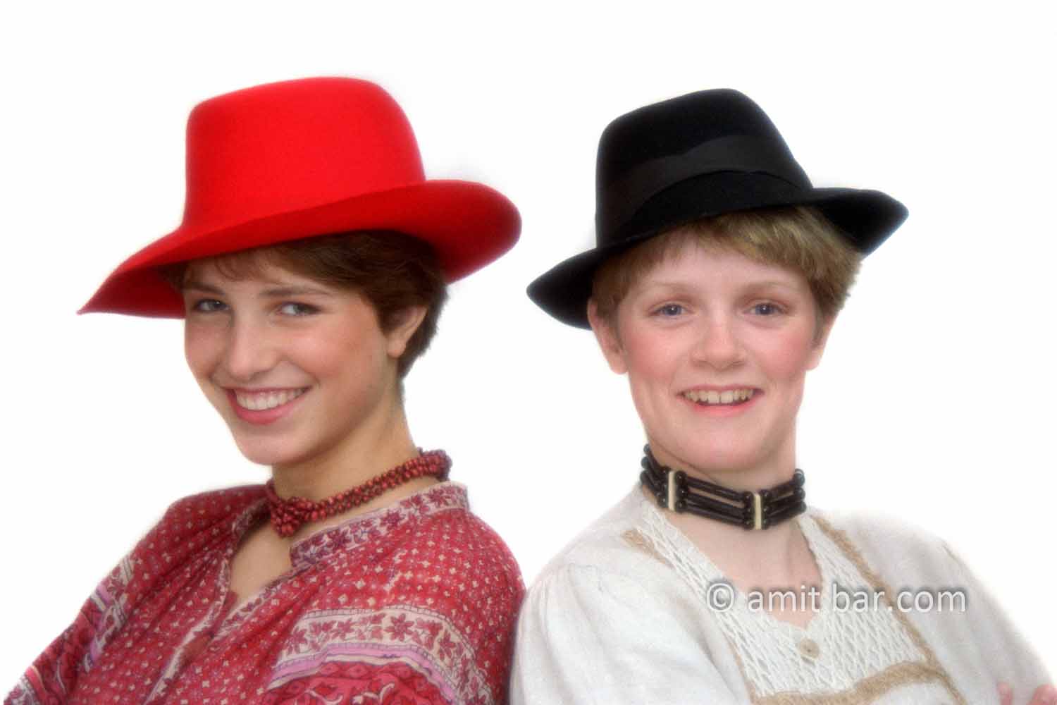 Portrait of two young girls: Portrait of two young girls with hats
