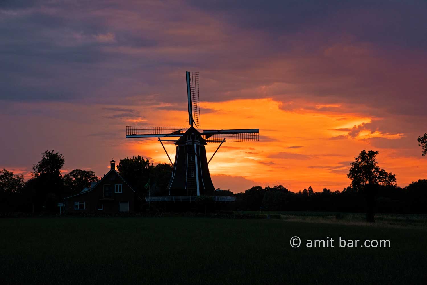 Rain clouds, sunset and windmill I: Rain clouds, sunset and windmill in Doetinchem, The Netherlands
