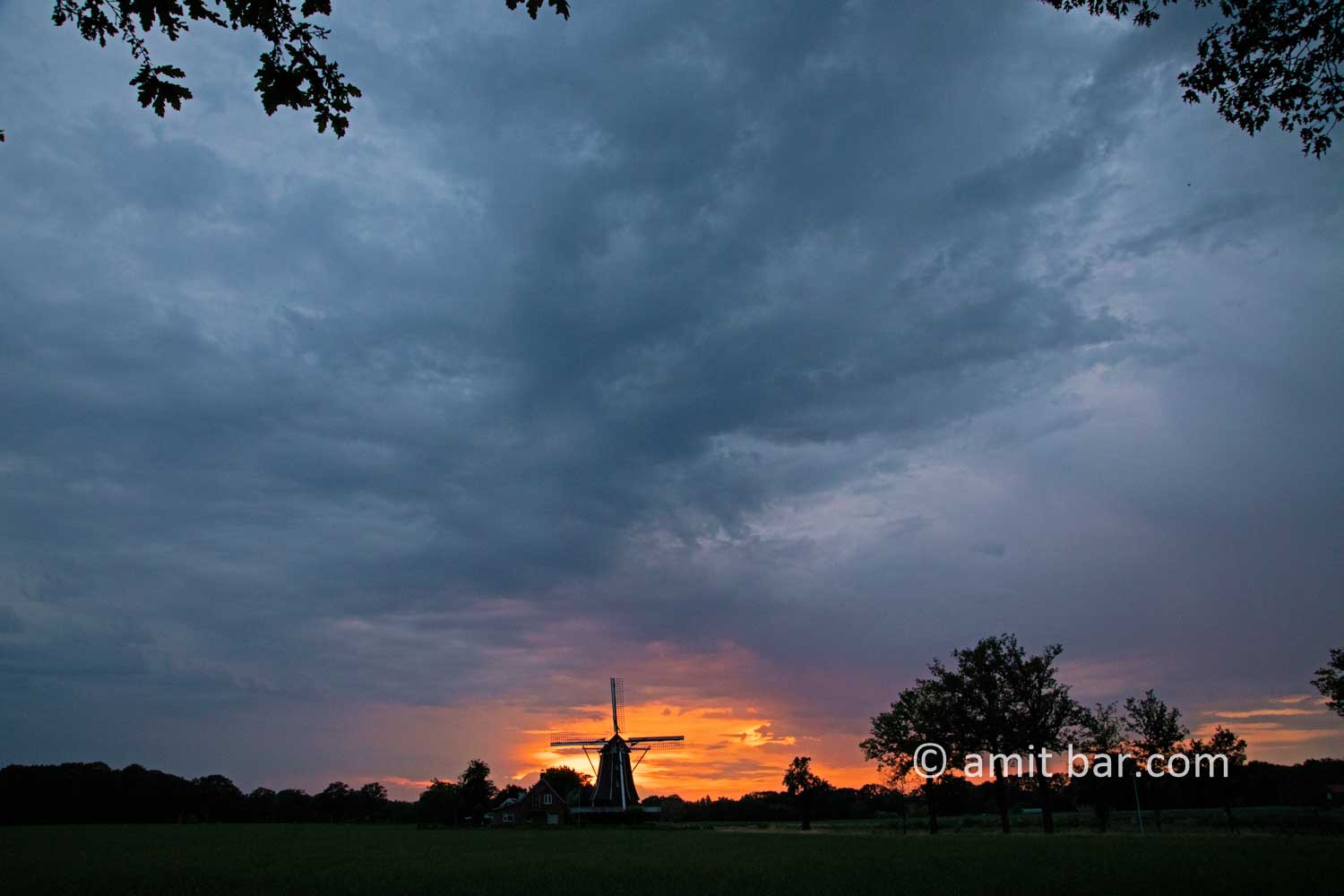 Rain clouds, sunset and windmill II: Rain clouds, sunset and windmill in Doetinchem, The Netherlands