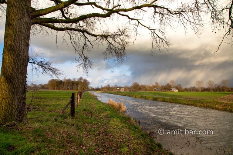 Rain clouds and rainbow