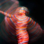 Rainbow I: Body-painted model in coloured stripes