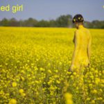 Rapeseed girl video: A rapseed field is beautiful, but is twice so beautiful when a body-painted girl is walking among the flowers.