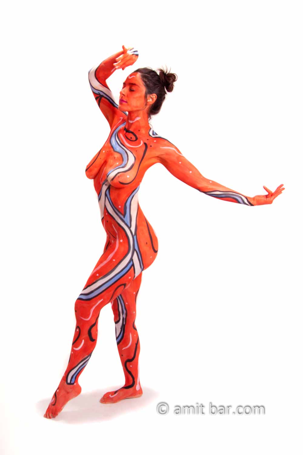 Red & Blue III: Body-painted model is dancing in red & blue design