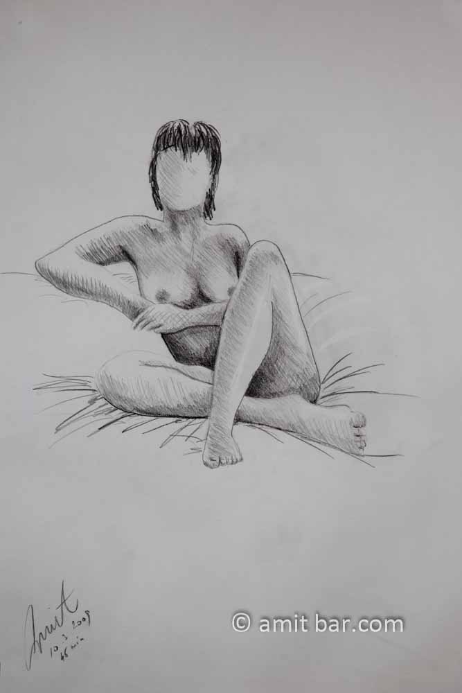 Seated nude model with crossed legs. Pencil drawing