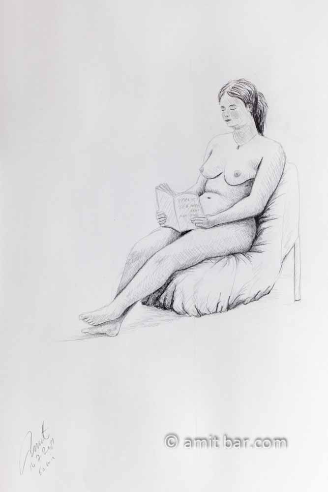 Seated nude reading a book. Pencil drawing