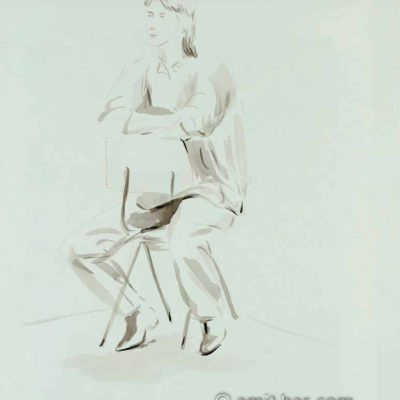 Seated woman on backwards chair