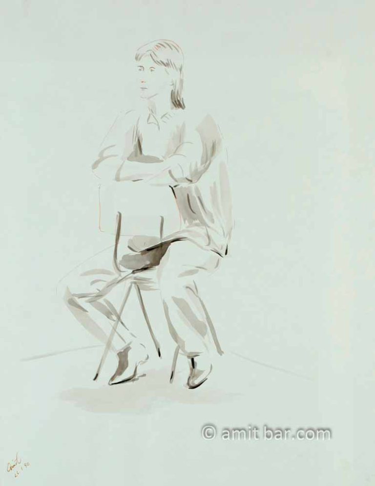 Seated woman on backwards chair