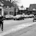 Shards bring luck: A man is wiping the street from the glass which fell down from his wagon