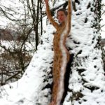 Snowy woman II: Body-painted model with snow line