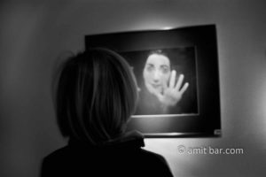 Stop!: A boy is looking at a hologram