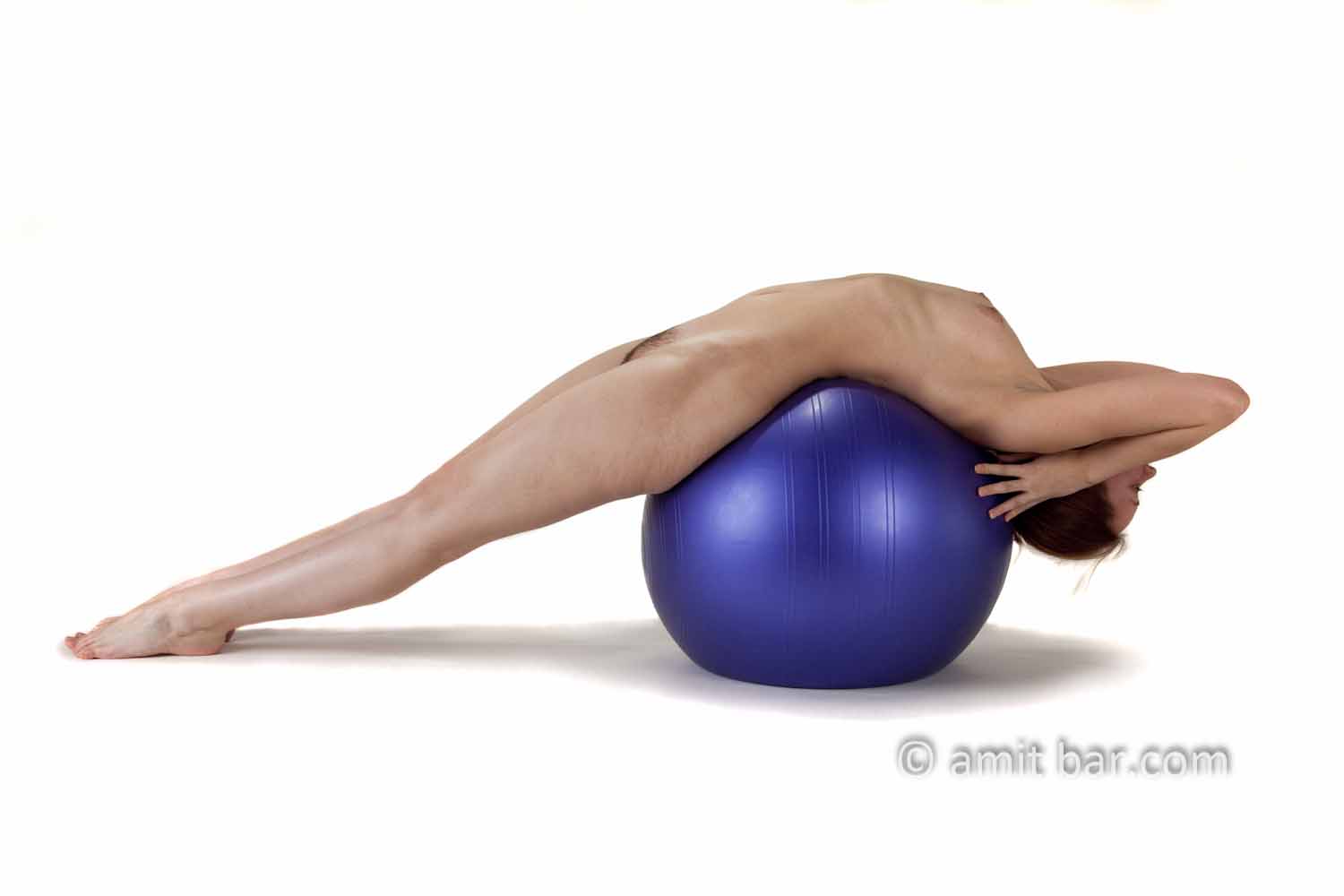 Streched I: A nude model on a blue ball